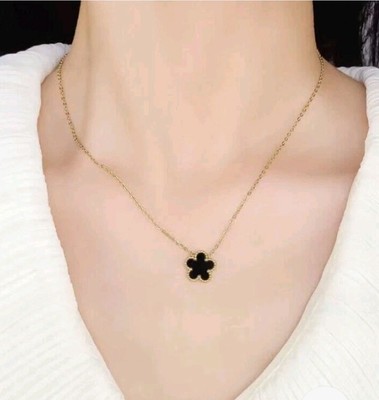 Black 5 Leaf Clover Pendant On A Gold Plated Necklace